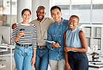 Portrait of a group of diverse cheerful businesspeople spending time in an office together at work. Happy business professionals smiling while bonding at work