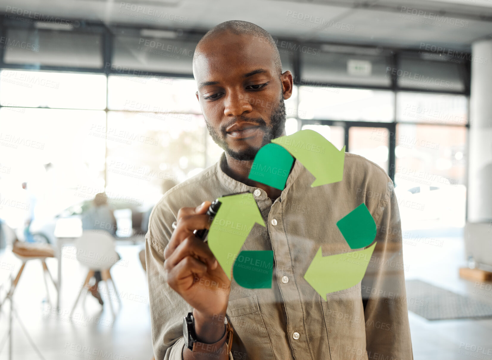 Buy stock photo Office, black man and recycle logo on glass wall with marker for eco friendly, environment or ecology. Business person, employee and overlay in brainstorming or planning for green and sustainability