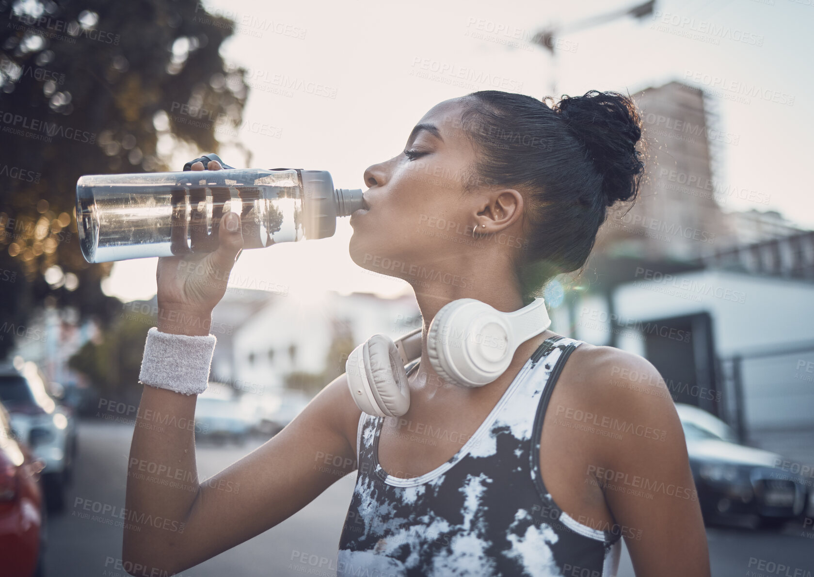 Buy stock photo Woman, city and athlete for drinking water on break, fitness and mineral liquid for nutrition. Female person, outdoor and exercise rest with bottle of aqua, urban town and beverage for refreshing