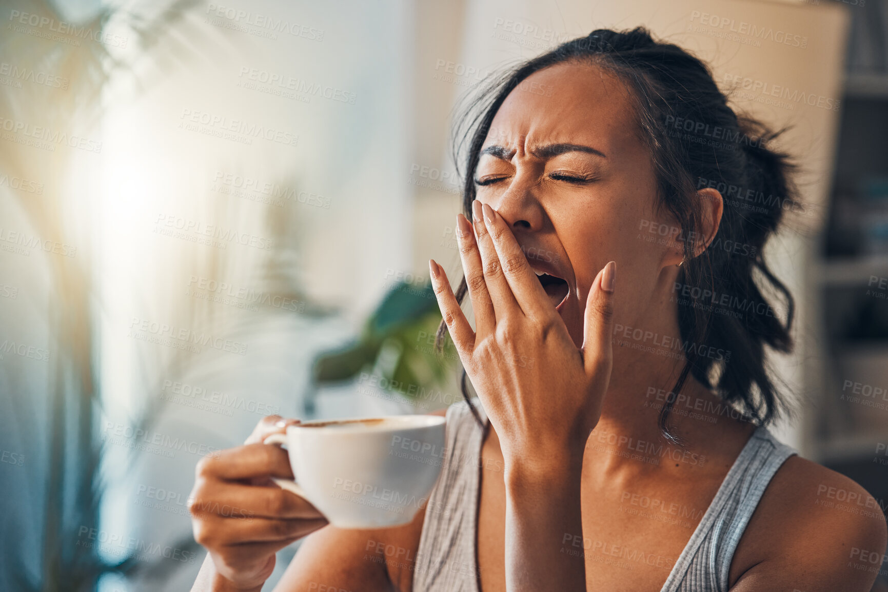 Buy stock photo Tired woman, yawn and morning with coffee or waking up for lazy, sleepy or nap at home. Young, female person or awake with cup of caffeine for beverage, drink or cappuccino in daily routine at house