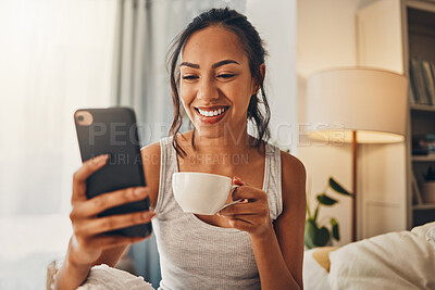 Buy stock photo Morning coffee, phone and happy woman in bedroom for social media, scroll and text message in home. Mobile, girl and drink tea in bed to watch video, reading blog or download app for news on internet