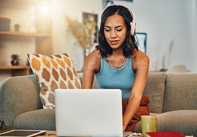 Buy stock photo Woman, laptop or headphones in home for remote work, editing or productivity on sofa. Freelance transcriptionist, writer or technology in living room for audio translation, subtitle or communication