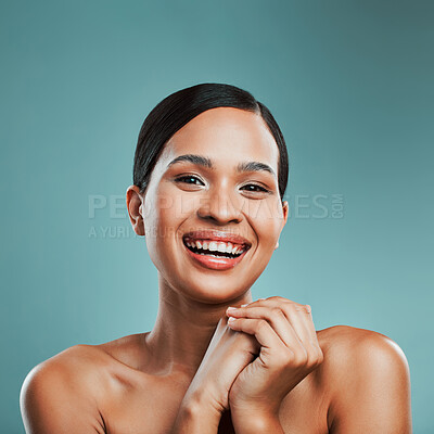 Buy stock photo Happy, portrait or woman with beauty, makeup or glow on face in studio on blue background. Antiaging treatment, smile or girl laughing with facial health for wellness, skincare or pride in France