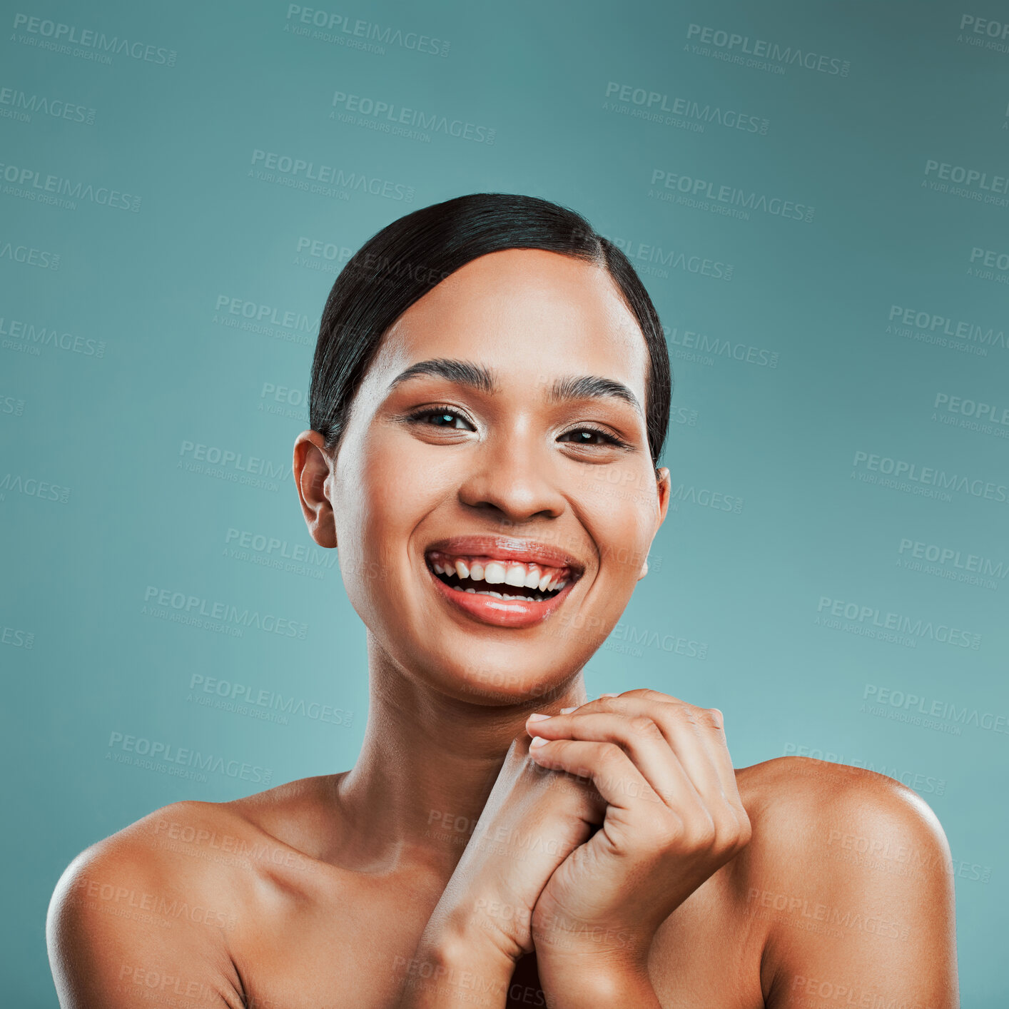 Buy stock photo Happy, portrait or woman with beauty, makeup or glow on face in studio on blue background. Antiaging treatment, smile or girl laughing with facial health for wellness, skincare or pride in France