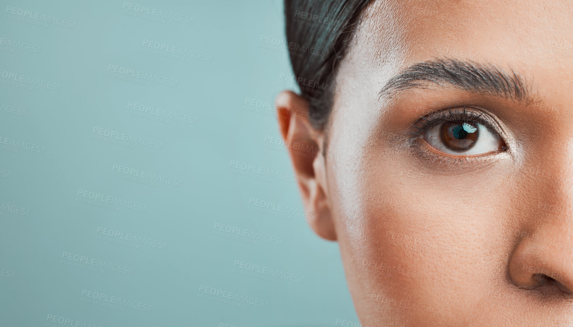 Buy stock photo Space, half portrait or woman with eyebrow, beauty or glow on face in studio on blue background. Cosmetics results, mockup or closeup of girl with facial health for skincare shine or lashes in France