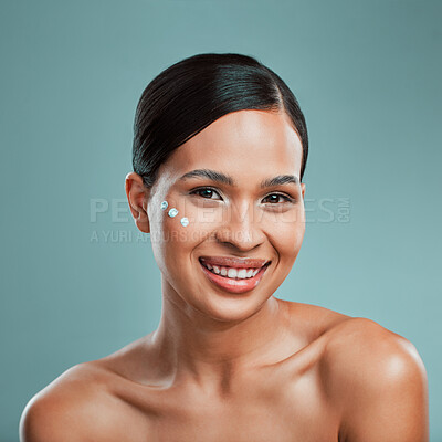 Buy stock photo Portrait, happy woman or facial with skincare cream or cosmetics for beauty, detox or moisture. Blue background, lotion or model in studio with smile or healthy face product for antiaging or glow