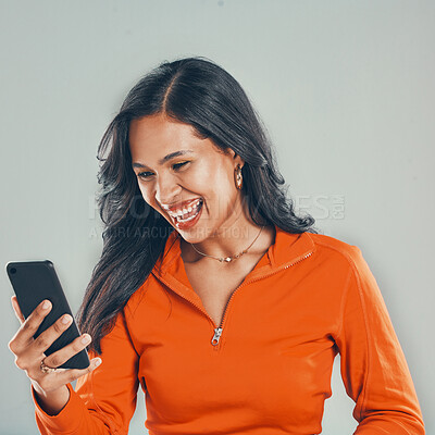 Buy stock photo Excited, notification and woman with smartphone, studio and reading of email, alert and happy for raise. Celebration, wow and person with app, lottery and winner of competition and white background