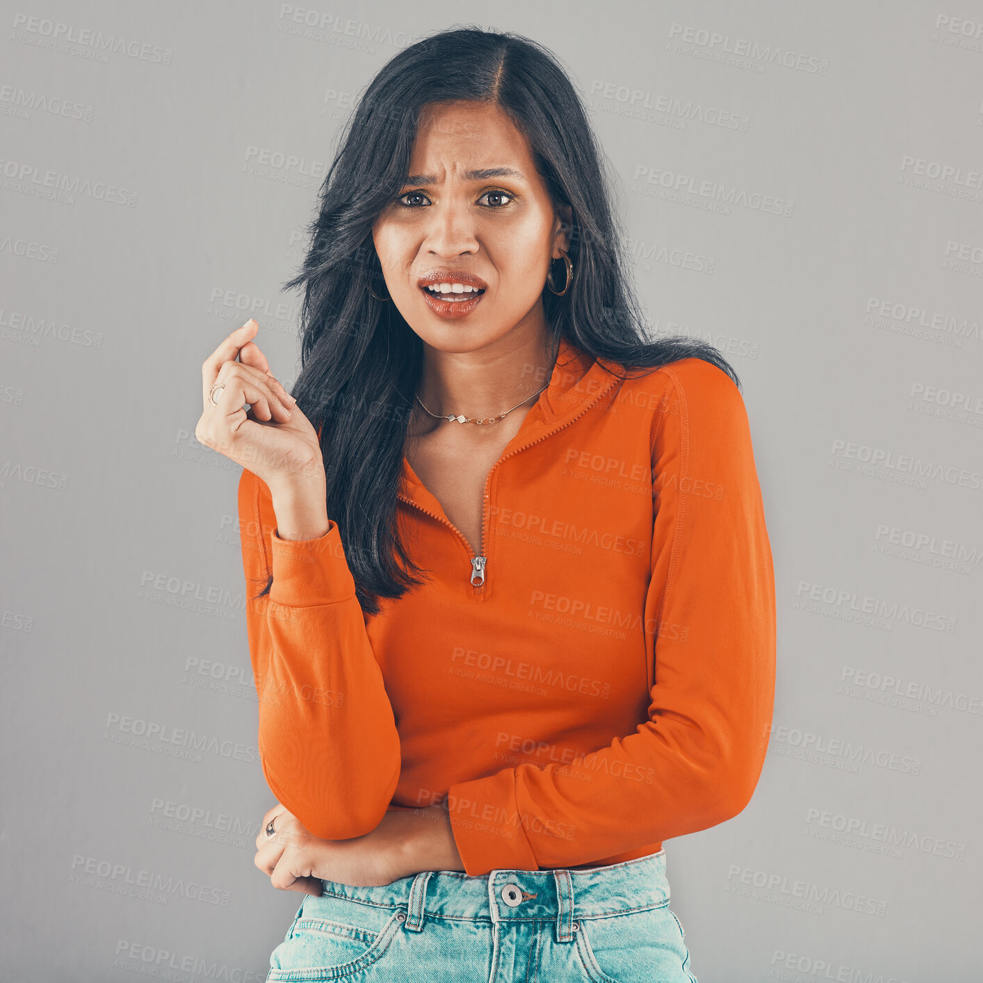 Buy stock photo Studio, frustrated and portrait of woman with shock, annoyed or fashion isolated on gray background. Face, surprise or angry girl with attitude, stress or wtf facial expression for bullying in Brazil