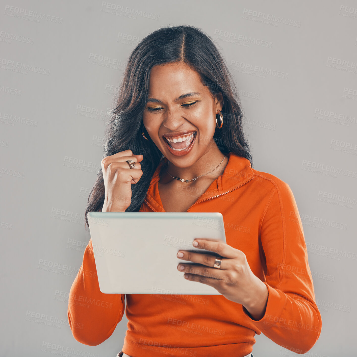 Buy stock photo Victory, reading and woman with tablet, studio and notification of email, alert and happy for raise. Celebration, wow and person with app, lottery and excited for competition and white background