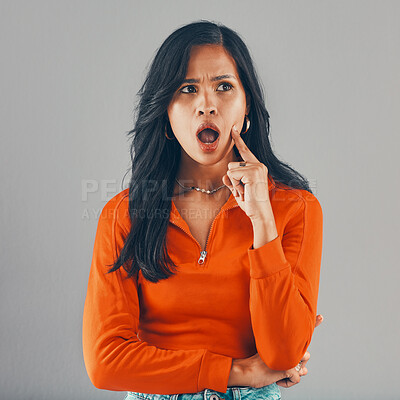 Buy stock photo Shock, confused and woman in studio with thinking, news announcement or memory of decision. Surprise, doubt and frustrated wow face of girl with ideas, reminder or omg gesture on grey background.