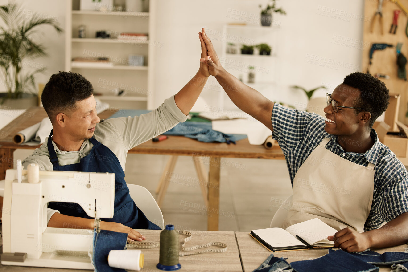 Buy stock photo Fashion, tailor and business people with high five for achievement, support and design success. Workshop, men and happy with hand gesture for manufacturing industry, textile production and teamwork