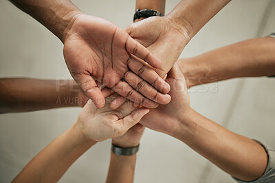 Buy stock photo Business, people and hands together for solidarity in office with below, unity and team building. Collaboration, employees and victory pile in celebration of company achievement, support or diversity