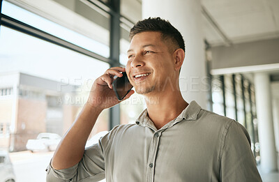 Buy stock photo Happy, businessman or talking with phone call for conversation or friendly chat at office. Young, male person or employee with smile on mobile smartphone for business discussion, app or communication