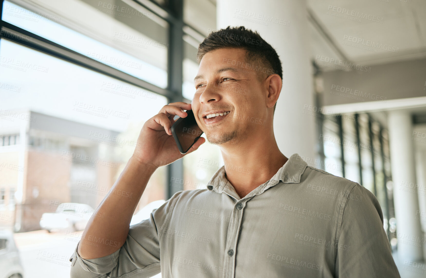 Buy stock photo Happy, businessman or talking with phone call for conversation or friendly chat at office. Young, male person or employee with smile on mobile smartphone for business discussion, app or communication