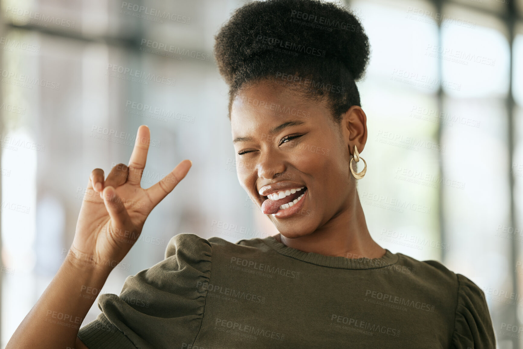 Buy stock photo Peace sign, fun and black woman in office, smile and tongue out for humor, hands and playful with confidence. Expression, gesture and goofy with comedy, confident and happy in business and joy