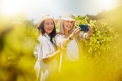 Buy stock photo Friends, smile and bonding of women, photography and together in vineyard, happy and memory of trip. Holiday, travel and picture for moment in vacation, environment and people in wine farm and online