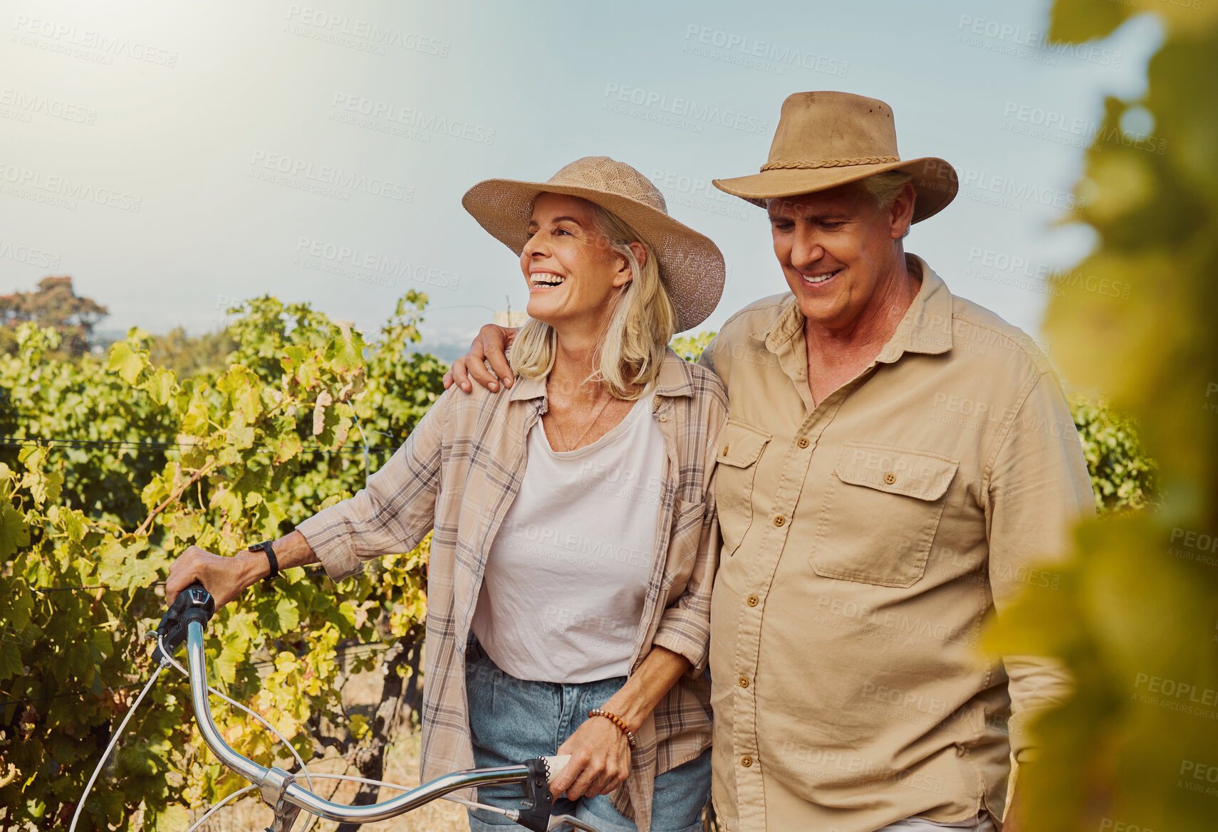 Buy stock photo Smile, mature couple and walk in vineyard for countryside, travel and holiday with bicycle. Senior people outdoor, adventure and bonding for retirement together with vacation, tour and sightseeing