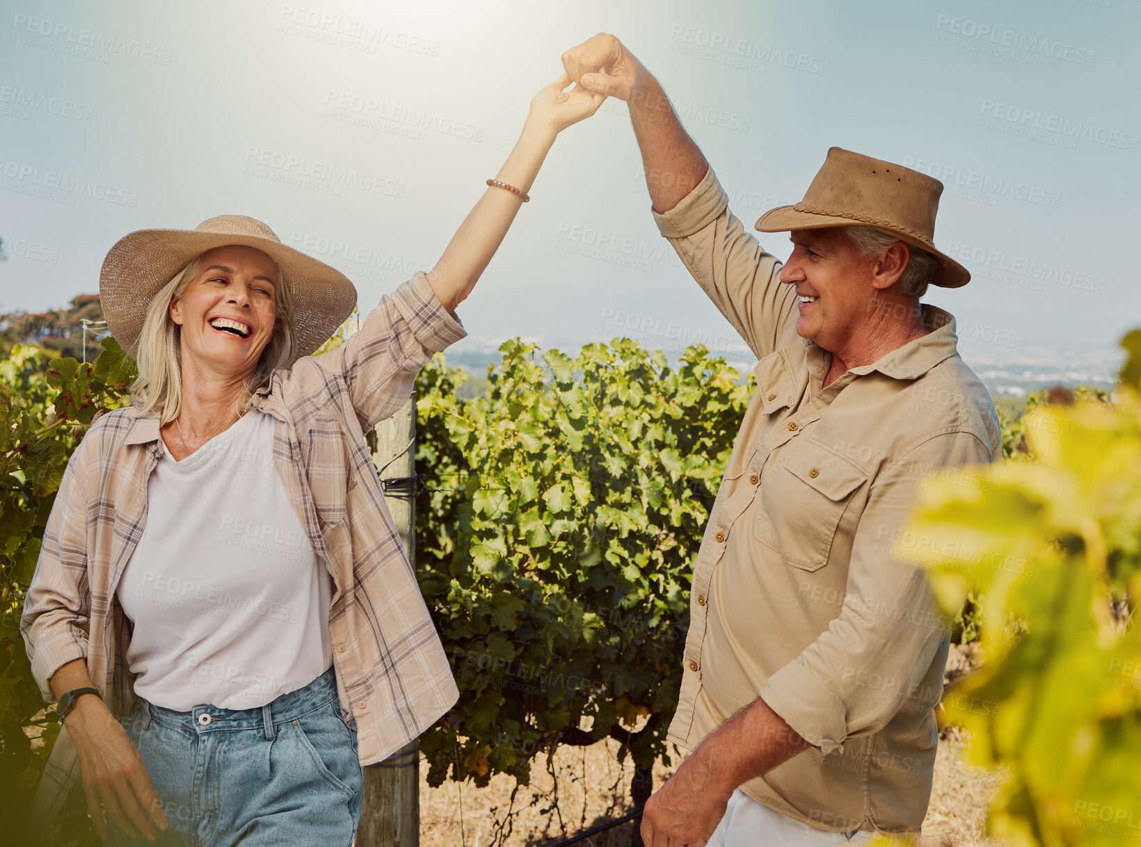 Buy stock photo Smile, senior couple and dance in vineyard for countryside, travel and holiday for happiness. Mature people outdoor, adventure and bonding for retirement together with landscape, tour and sightseeing