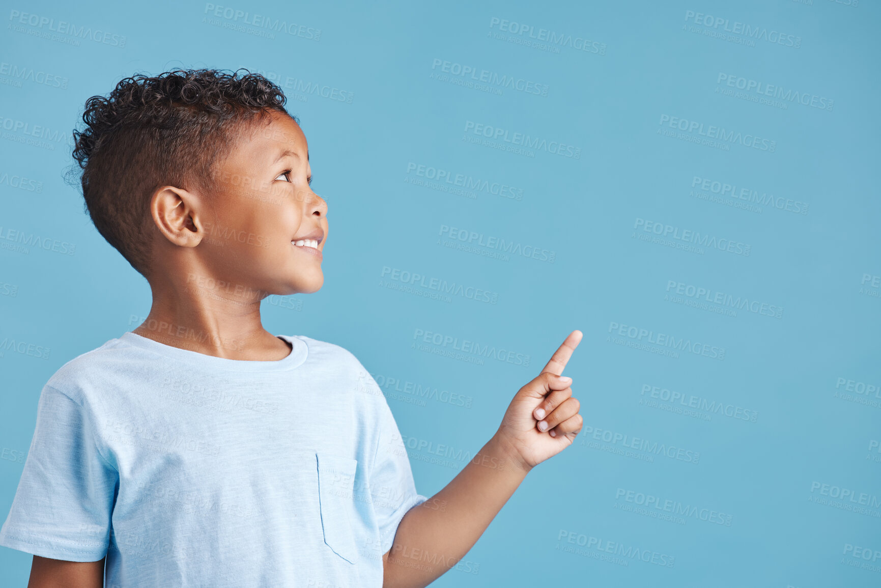 Buy stock photo Pointing, space and show with boy in studio for idea, announcement and information. Direction, notification and decision with child on blue background for promotion, presentation and process mockup