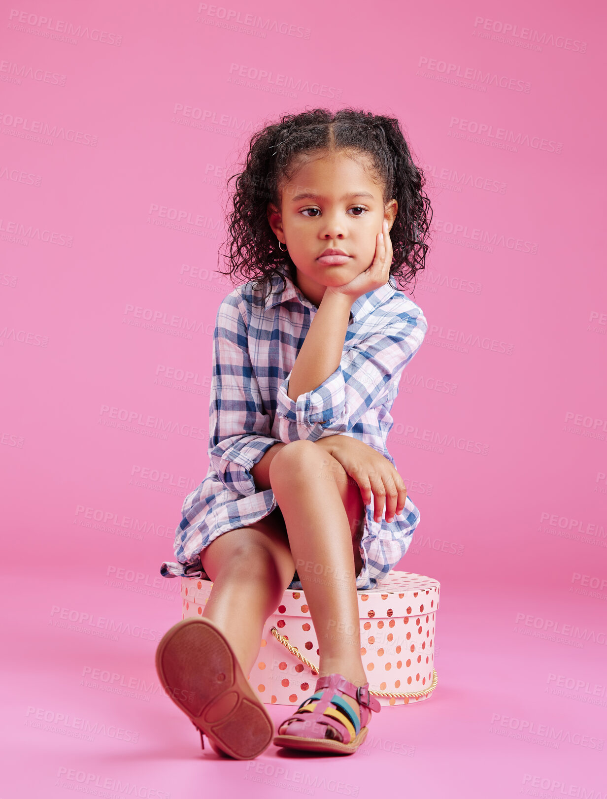 Buy stock photo Studio, box and bored girl child with sad birthday present, disappointed or unhappy thinking on mockup space. Frustrated, casual and annoyed kid sitting on gift with ideas, relax and pink background