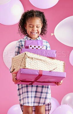 Buy stock photo Girl, child and gift box for birthday in studio with guess, surprise and excited by pink background. Kid, package and celebration with balloons, present and thinking for milestone in childhood