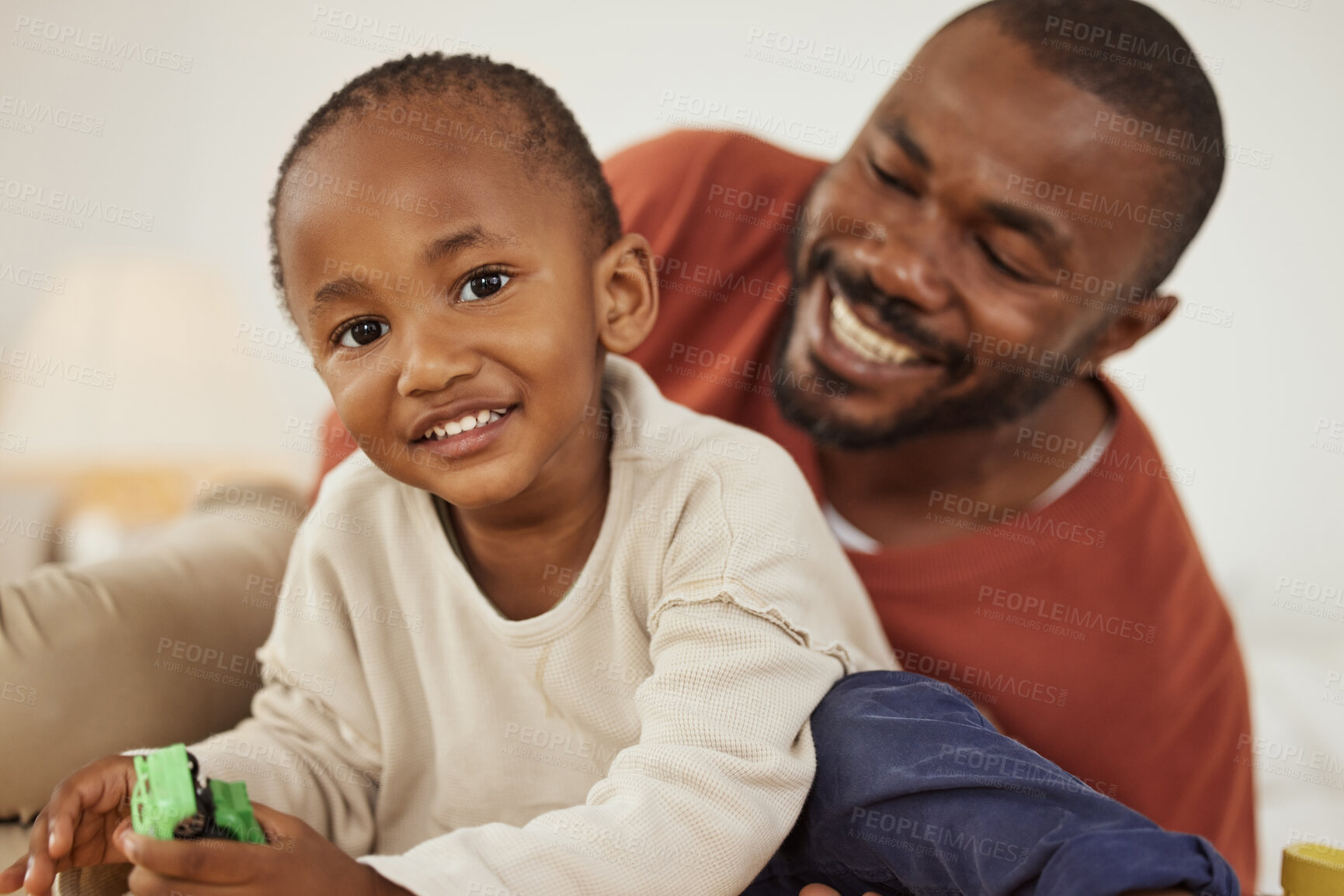 Buy stock photo Happy, African and dad with child on bed for bonding, relax together and playful relationship in morning. Family home, love and portrait of father with boy in bedroom for playing, fun and comfort