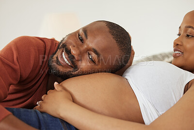 Buy stock photo Black man, pregnant woman and listen with belly in bedroom with smile, excited and bonding in home. Couple, parents and happy with stomach, baby and kicking with connection in morning at apartment