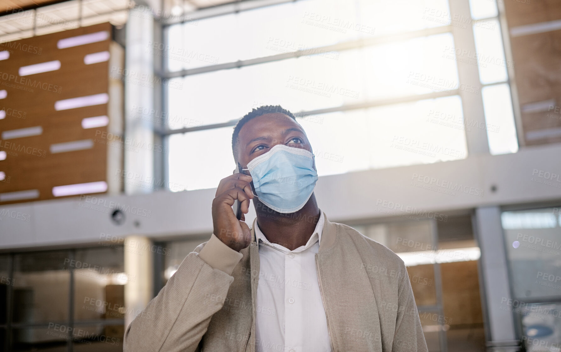 Buy stock photo Black man, mask and phone call at airport with thinking, schedule or terminal with safety on global travel. Person, listening and ppe with chat, smartphone and contact on international business trip