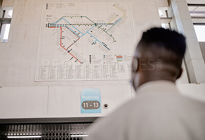 Buy stock photo Man, travel and train station map with commute, trip and urban subway information for passenger. Back, waiting and public transport in New York with city board, direction and gate check abroad