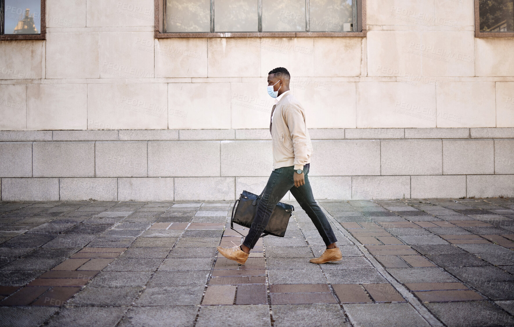 Buy stock photo Black man, luggage and face mask for travel outdoor of compliance, health safety and morning journey. Male person, walking and bag with healthcare policy, commute delay and ppe protection for covid19