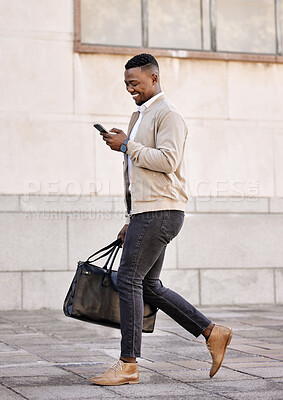 Buy stock photo Smile, business and black man with phone for commute schedule, urban travel and communication. Male person, mobile and walking with luggage for appointment, morning journey and interview opportunity