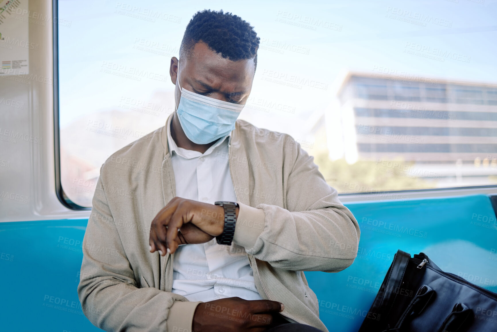 Buy stock photo Black man, train and check watch on travel, journey and face mask for safety, virus or pollution. Person, clock and time on business trip with ppe, reminder and public transport with thinking on ride