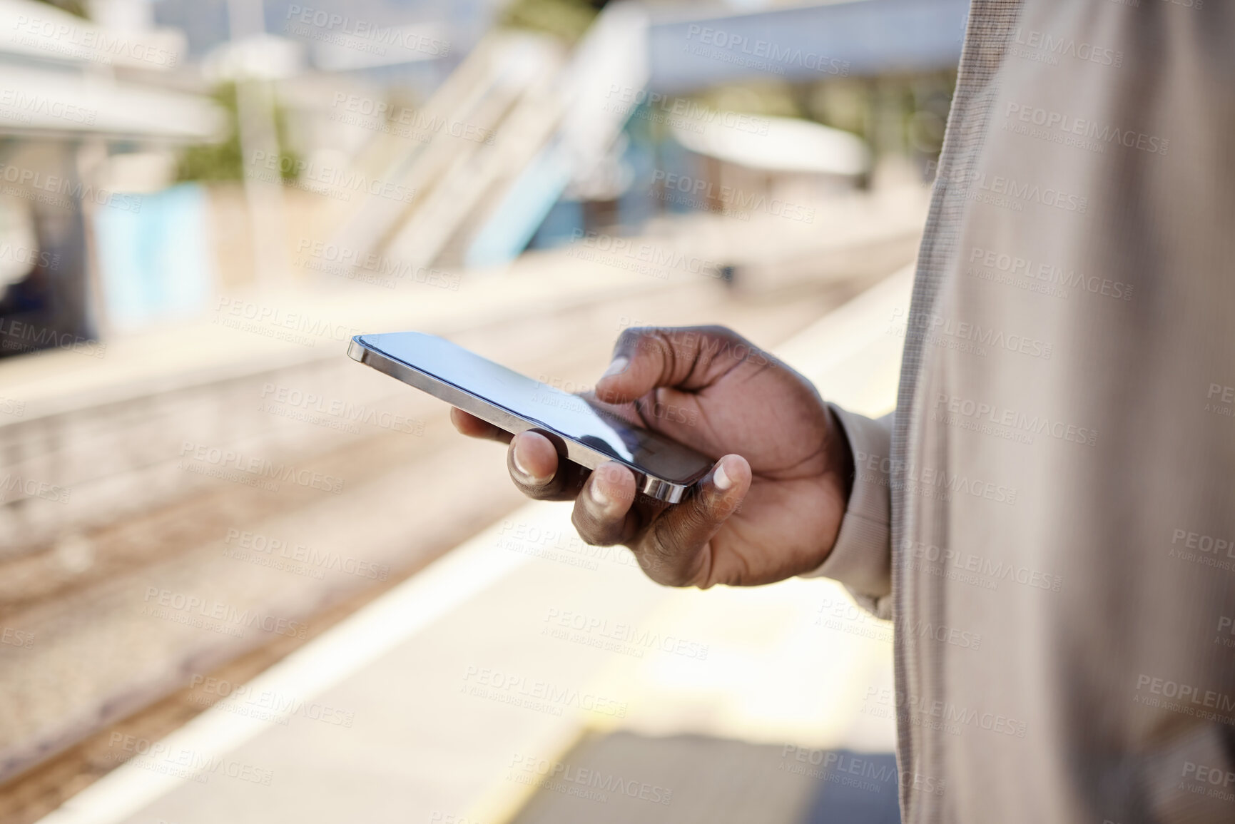 Buy stock photo Hands, person and check phone for travel with train schedule, metro commute and waiting on transport. Employee, mobile and communication with luggage, morning journey and location for subway delay

