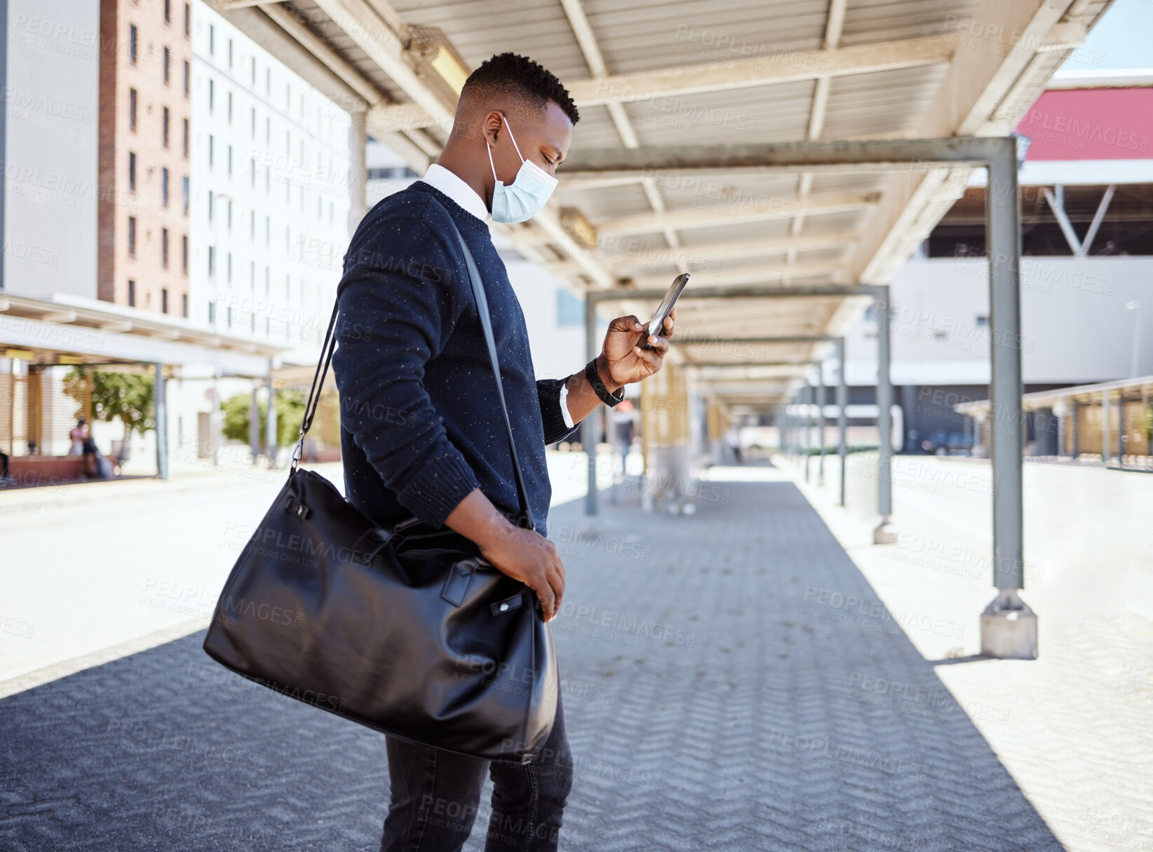 Buy stock photo Black man, face mask and phone for train travel with compliance, health safety and morning journey. Male person, mobile and schedule with healthcare policy, commute delay and ppe for subway transport