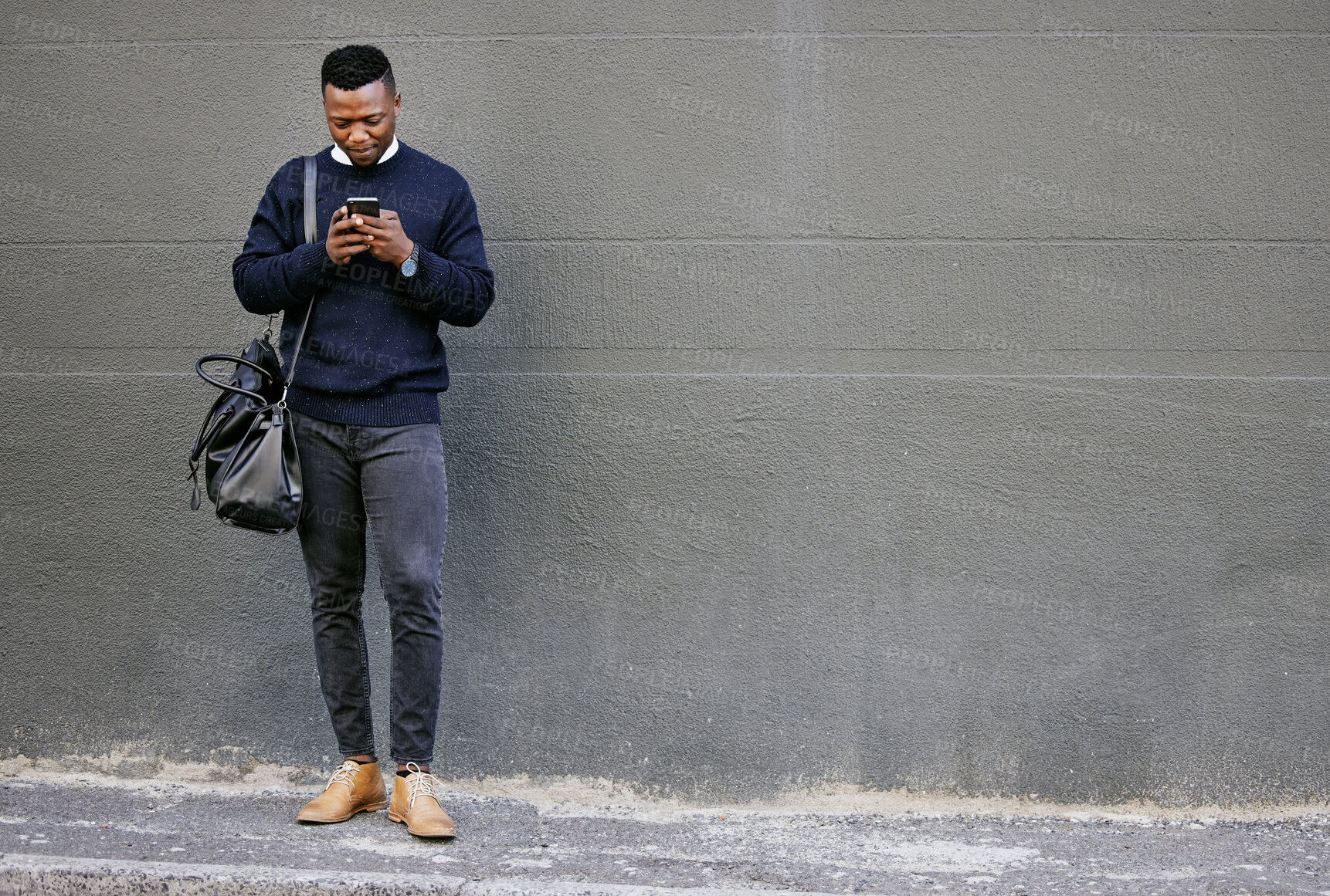 Buy stock photo Black man, typing and phone with travel in city of schedule, morning commute and waiting on transport. Person, mobile and relax for communication, luggage journey and online map of direction outdoor