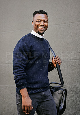 Buy stock photo Happy, bag and portrait of businessman in city walking  by wall for commuting to work. Travel, smile and African male financial advisor from Nigeria with corporate satchel for trip in urban town.