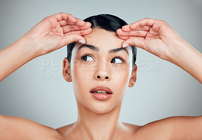 Buy stock photo Face yoga, beauty and collagen with woman in studio for lymphatic drainage, wellness and anti aging. Skincare, cosmetics and dermatology with person on white background for massage and facial