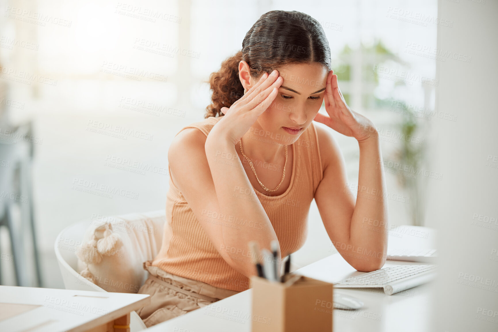 Buy stock photo Frustrated woman, headache or stress with deadline in depression, overworked or burnout at office. Young, female person or employee with migraine, strain or pressure for fatigue, vertigo or dizziness