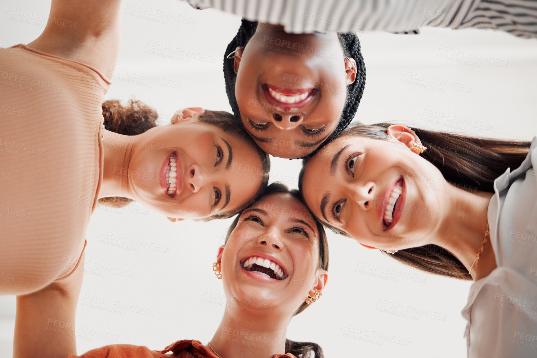 Buy stock photo Office, business people and laughing with hug for teamwork, support and achievement in creative agency. Low angle, employees and group of women with huddle for startup success, happy and solidarity