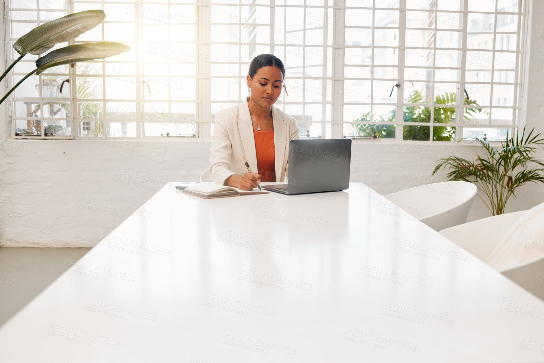 Buy stock photo Woman, writing and notes with laptop in modern office for planning, review or schedule at insurance company. Person, notebook and computer with ideas, feedback and perspective for project management