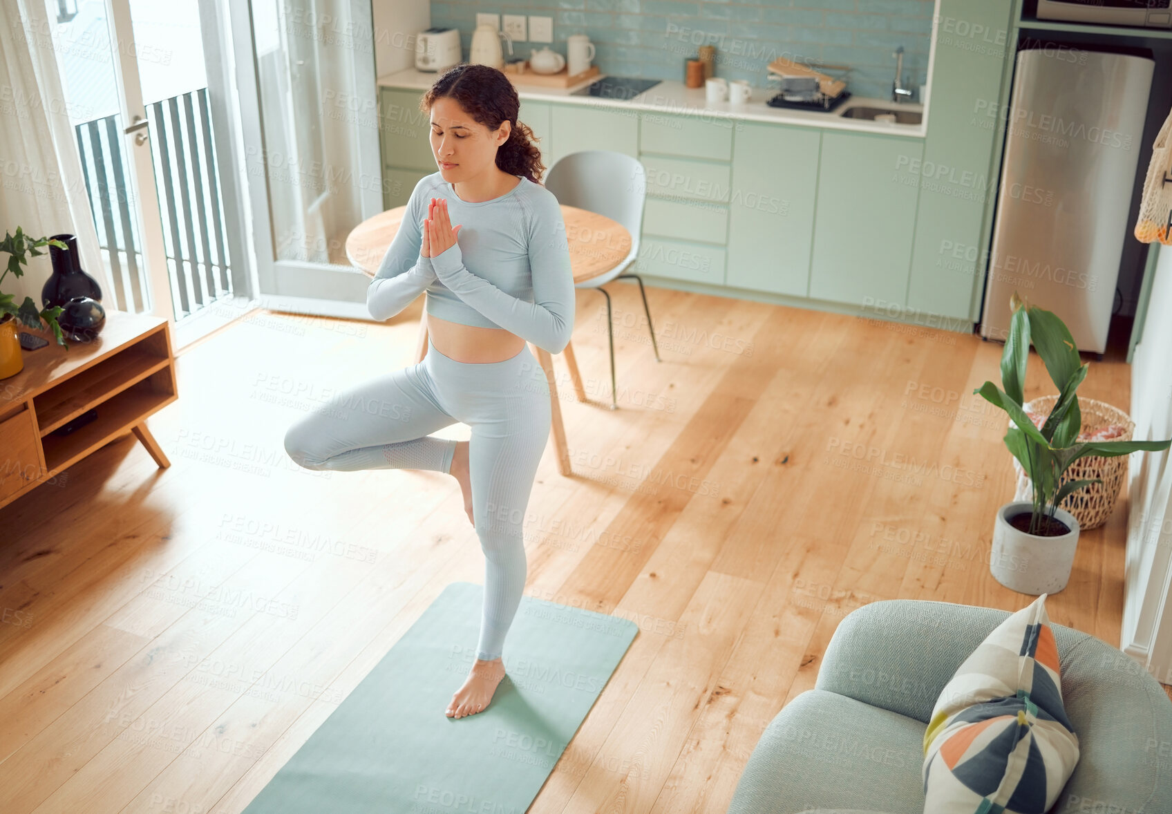 Buy stock photo Yoga, meditation and woman balance in home for wellness, healthy body and mindfulness on floor. Pilates, prayer hands and person on mat for calm exercise, workout and spiritual awareness in morning