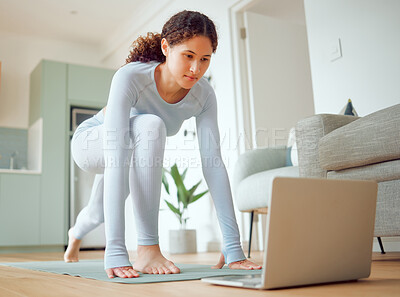 Buy stock photo Woman, stretching and laptop with yoga in home for virtual class, subscription and fitness in morning. Floor, mat and person with technology in living room for online course, exercise and instruction