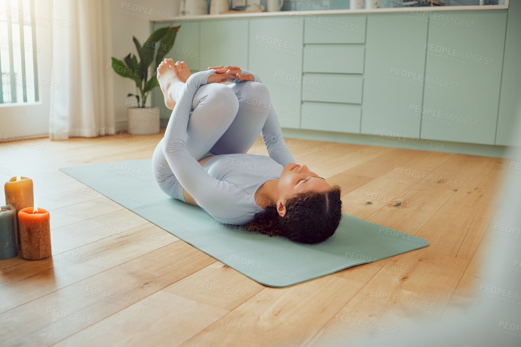 Buy stock photo Woman, stretching and knees on floor in home with yoga, breathing and mindfulness in morning. Girl, person and apanasana pose for wellness, health and circulation with peace, balance and exercise mat