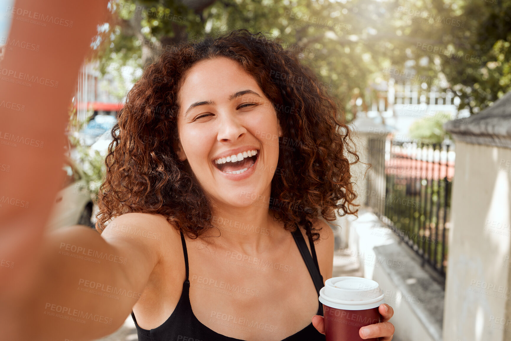 Buy stock photo City, selfie and woman with coffee, smile and confidence on outdoor walk for live streaming. Student, tourist or happy gen z girl with drink, urban adventure or digital photography on morning commute