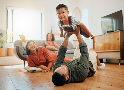 Buy stock photo Support, airplane and lifting with family on floor for love, playful game and happiness. Care, bonding and laughing with child and parents in living room at home for silly, comedy and funny
