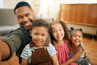 Buy stock photo Father, selfie and children on floor with hug, smile and care with bonding, love and photography at family house. Dad, man and kids with profile picture, excited and relax with post on social media