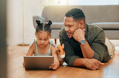 Buy stock photo Father, child and tablet on floor in home for playing games, watching online cartoons and bonding together. Man, girl kid and digital tech in living room with movie entertainment on streaming service