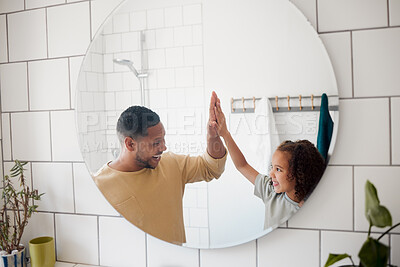 Buy stock photo Bathroom, high five and dad with child in mirror for dental hygiene, brushing teeth and cleaning. Health, family and father with girl for learning skincare, wellness and washing for morning routine