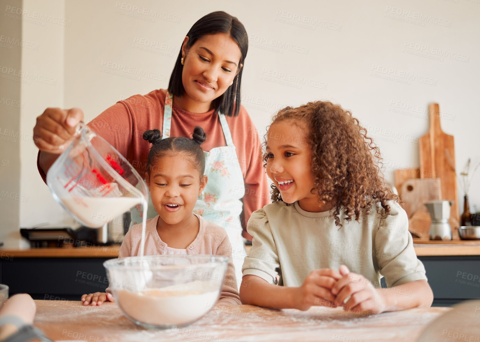 Buy stock photo Baking, children and woman with milk in kitchen for support, help and teaching recipe on weekend. Home, kids and mother with flour in bowl for ingredients, preparation and learning to cook together