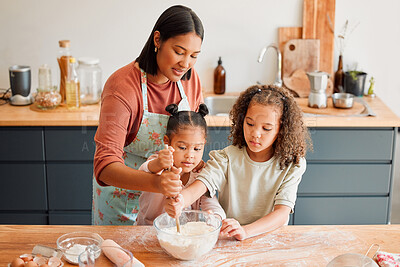 Buy stock photo Kitchen, woman and mixing in bowl with children at home for support, help and learning baking recipe. Family, mother and kids with spoon on table for ingredients, preparation and teaching to cook